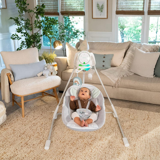 Columpio para Bebes Motorizado 5 Velocidades con Móvil Luminoso, Sonidos y Reclinable. Ingenuity InLighten