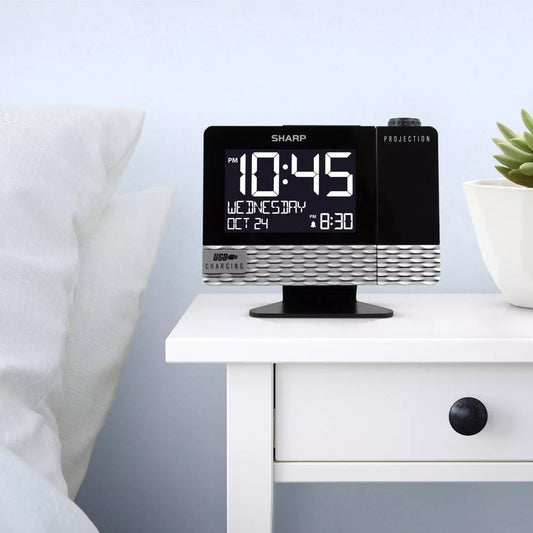 Reloj despertador moderno, con proyector y puertos de carga USB. Sharp