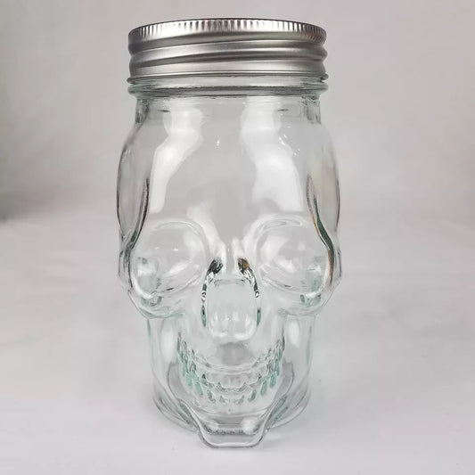 Frascos con tapa con forma de calavera de 545ml. 6 negros 6 transparentes. 12 en total